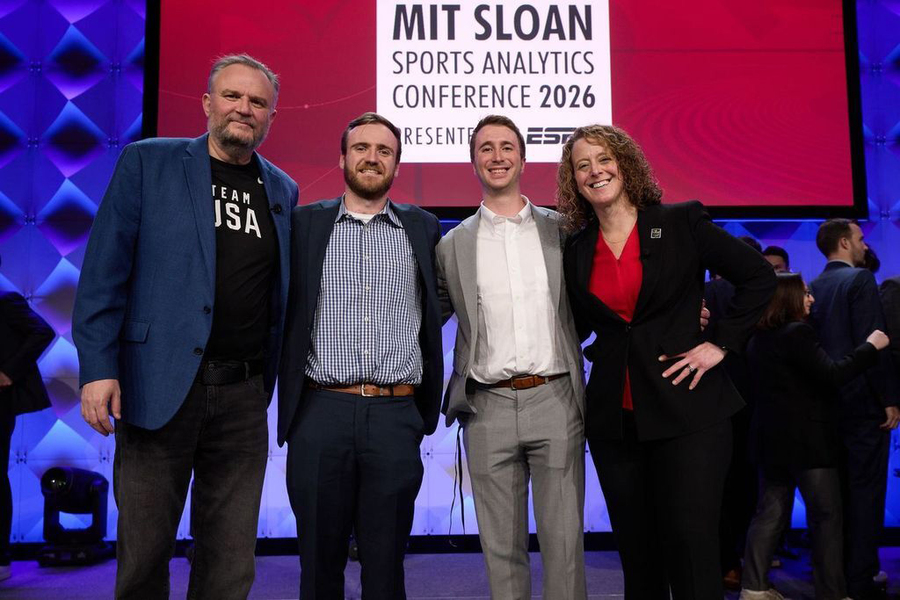 Four people pose for portrait on stage with the text "MIT Sloan Sports Analytics Conference 2026."