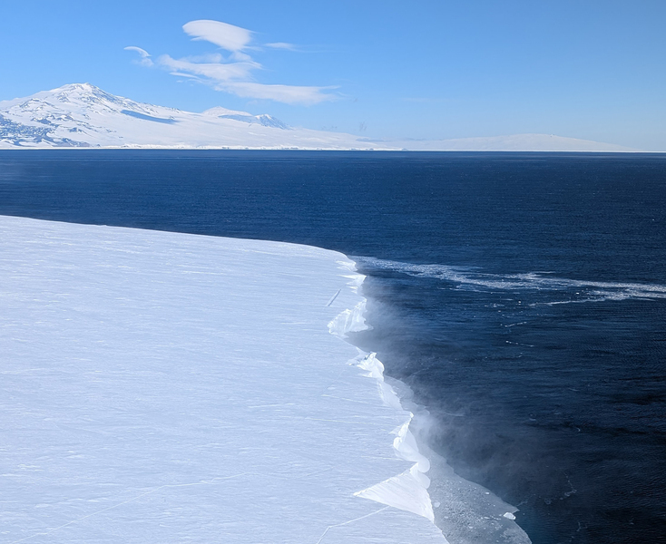The edge of an ice sheet next to the ocean