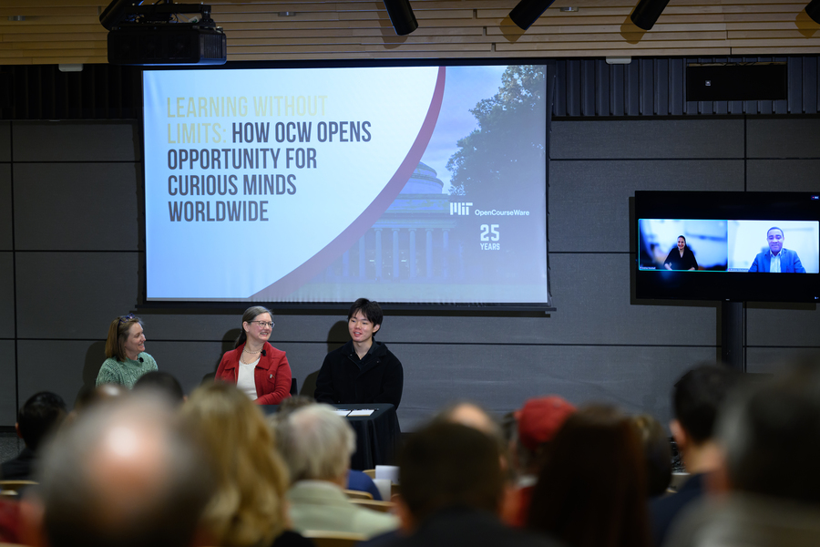 Three seated people speaking to an audience, with a screen in the background that states "Learning without Limits: How OCW opens opportunity for curious minds worldwide"