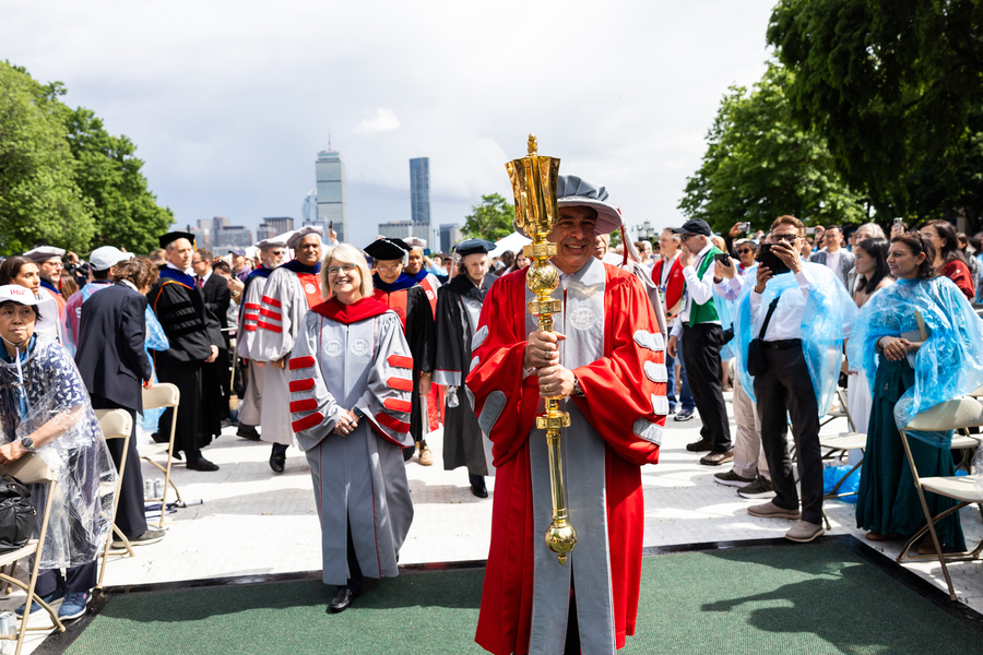 The procession with Boston skyline 