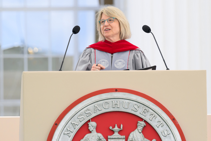 Sally Kornbluth speaks at a podium