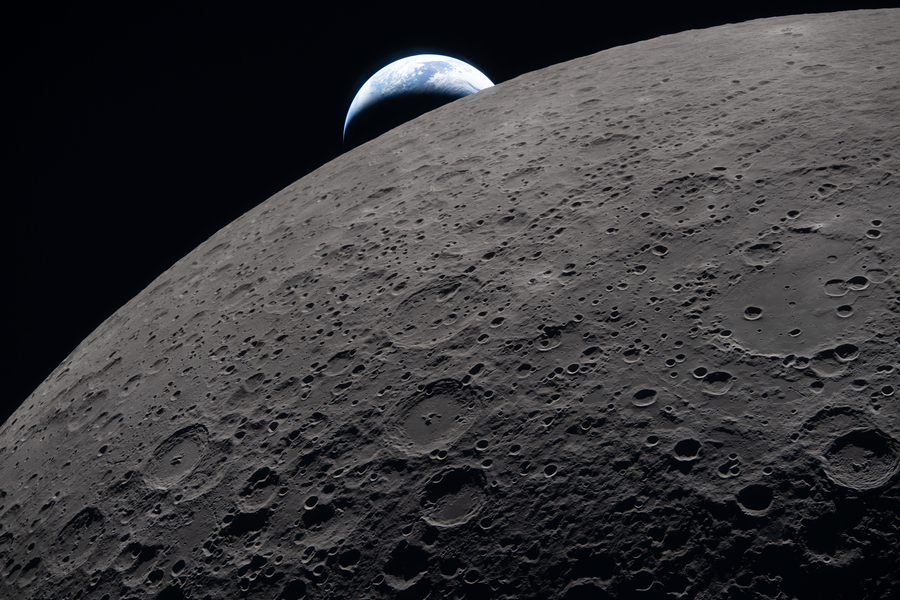 Earth sets behind the Moon, as captured from the Artemis II Orion spacecraft.