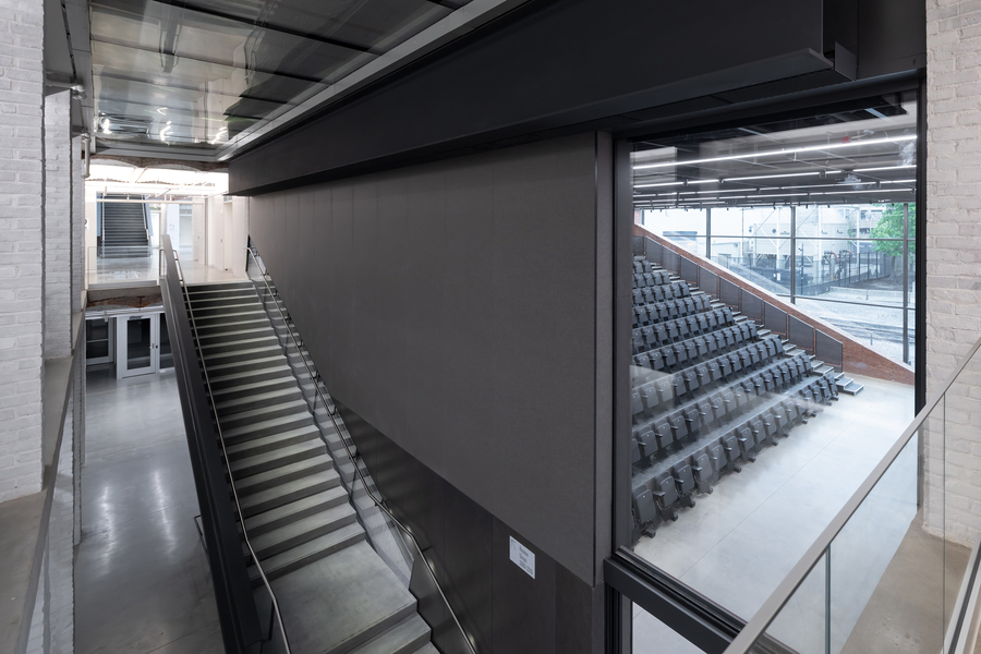 Interior shot of the Met Warehouse showing the auditorium and a staircase