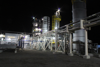 Photo of InEnTec waste conversion facility at night