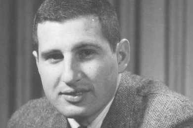 Black-and-white portrait photo of Ernest Cravalho as a young man