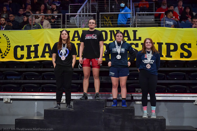 Photo of Sarah Sams atop the winners' podium at the NCWA National Championships.