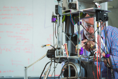 George Lordos tinkers with a device