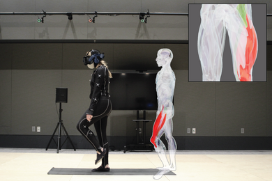 A woman wearing a motion-capture suit and virtual reality headset walks on a mat. To her right is a virtual representation of a body highlighting the muscles in use.