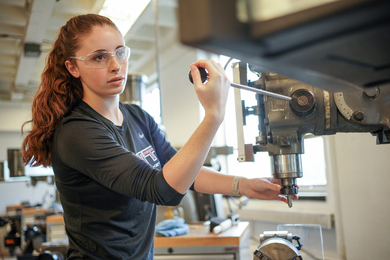 review of related literature about science example Liberty Ladd wears safety goggles while operating a large drill machine in a workshop.