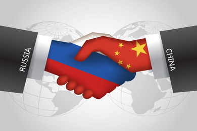 Illustration of two shaking hands. Both wear suits, while one hand is in the colors of the Russian flag and the other is in the colors of the Chinese flag. A graphic of world continents is behind them.