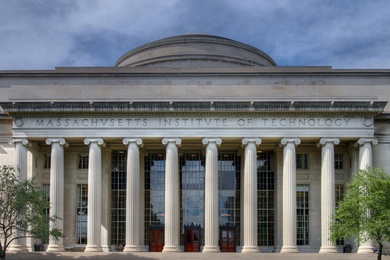 Photo of the facade of MIT’s Building 10, which features columns and the MIT Dome