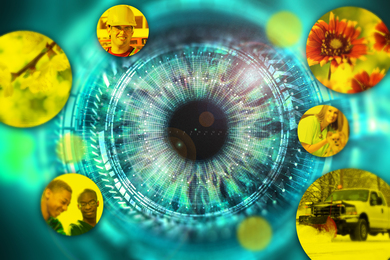 A blue-tinted human eye has a robotic-like overlay. The edges of the image have yellow circles showing scenes like people smiling, flowers, and a truck. These circles get blurrier the further away from the eyeball they are.