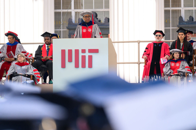 Melissa Nobles stands at podium while speaking at MIT Commencement.