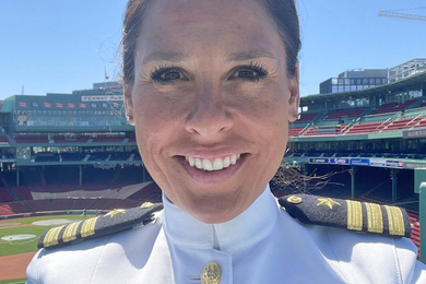 Jennifer Huck takes a selfie in her white naval dress uniform at Fenway Park