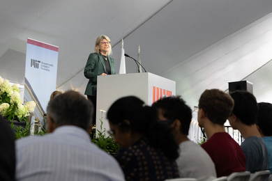 medical research on mice Sally Kornbluth speaking at a podium