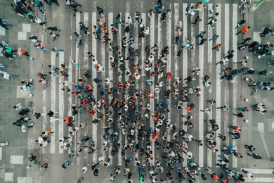 Aerial view of many people on a crosswalk