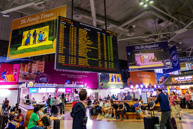 A large train schedule board at Boston’s South Station.