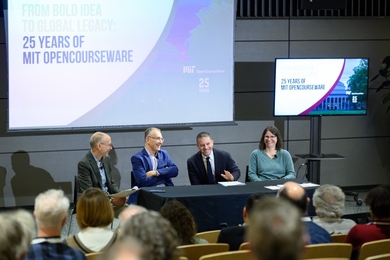 Four people sitting at a table speaking to an audience, with a screen in the background that states "From Bold Idea to Global Legacy: 25 years of MIT OpenCourseWare"