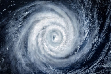 Swirling clouds of a well-defined cyclonic storm seen from space