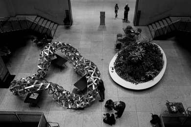 A room size metal sculpture waiting to be hung at the Boston Public Library