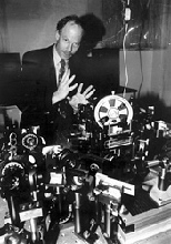 Professor Keith Nelson with the laser equipment he uses at the Plasma Fusion and Science Center to analyze thin films used in microelectronics components.