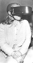 Senior Tyra Rivkin wears the helmet her team designed and built for testing peripheral vision in NASA's microgravity aircraft.