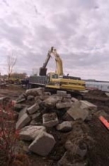 Work began recently on the Vassar Street site of the new undergraduate dormitory, Simmons Hall. Portions of the West Parking Lot have been closed off and the concrete torn to rubble.