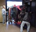 How do you move a Volkswagen Beetle into a building? Very carefully.
