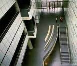 Lobby, Wiesner Building
Architect: I.M. Pei
Balustrades and seating: Scott Burton
Steel and concrete, 1985
Wall mural: Kenneth Noland
Here-There, 1985
Colored painted inserts in wall
