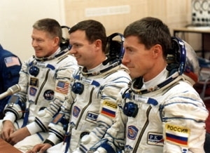 The ISS Expedition 1 crew prior to launch from the Baikonur Cosmodrome. Left to right: crew commander William Shepherd, Yuri Gidzenko and Sergei Krikalev.
