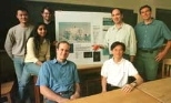 Professor Nicholas Makris (second from right, standing) holds an acoustic sensor that his lab is developing. His research group hopes the sensor will help scientists learn whether there is a liquid ocean under the ice of Jupiter's moon Europa. The group includes (left to right) Sunwoong Lee, Purnima Ratilal, Josh Wilson, Michele Zanolin and Yi-San Lai (both seated at table), and Aaron Thode (far r...