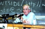 Noam Chomsky addressed a packed Room 26-100 and overflow crowds in five other rooms.