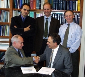 MIT Professor Lionel Kimerling (left) and Pirelli Labs Optical Innovation        Vice President Giorgio Grasso (right) gathered with (left to right) Dr.        Massimo Gentili, Head of Nanotechnology, Pirelli Labs Advanced R&amp;D;        Dr. Marco Romagnoli, Head of the Optical Devices, Pirelli Labs Advanced        Photonics Research; and Dr. George Kenney, MIT Microphotonics Center Associate    ...