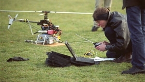 Vladislav Gavrilets, an aeronautics and astronautics doctoral student, prepares to launch the robocopter in its early-morning flight Monday.
