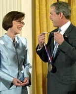 President Bush presents the National Medal of Science to Ann M. Graybiel from  MIT during a ceremony in the East Room of the White House, Wednesday, June 12,  2002.