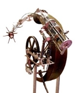 "Dirty Red" is a robotic sculptural amalgamation of motors, rusty metal and "artificial-unintelligence," built by electrical engineering and computer science graduate student Aaron Edsinger. The sculpture will be featured in an installation created in collaboration with sound artist Jeff Weber, a research engineer in the AI Lab.