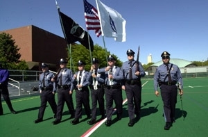 The new MIT Campus Police drill team practices for its appearance at Commencement.  Left to right: Patrol officers Duane Keegan,Willard Boulter, Bennett Chin, William Smith, Kevin O'Connor, Jamie DiGregorio and Lt. Daniel Costa (Officer Orlando Tirella is absent).