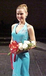 Senior Erika Ebbel smiles after placing third  in the 2002 Miss Massachusetts contest.