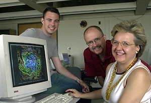 Lodovica Illari (right), a lecturer in meteorology, and Rob Korty (left) and Greg Lawson, graduate students in earth, atmospheric and planetary sciences, are members of the MIT team that won a national weather forecasting competition.
