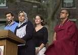 Representing their faiths at the podium are (left to right) Andrew Goldsweig, a Jewish senior in chemistry; Sarah Saleh, a Muslim graduate student in aeronautics and astronautics; Maureen Long, a graduate student in earth, atmospheric and planetary sciences, representing Christian traditions; and Buddhist Priyadarshi Shukla of the Harvard Divinity School.
