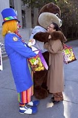 Tracy Daniels gets a hug from Tim the MIT mascot.