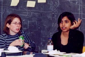 Maia Mahoney, left, a sophomore in electrical engineering and computer science, confers with graduate student Reshma Shetty of the Biological Engineering Division during the January IAP course, "Synthetic Biology Lab: Engineered Genetic Blinkers."
