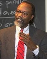 Chancellor Phillip Clay speaks at the first of three community meetings held in 10-250.