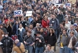 The crowd listens intently at Thursday's anti-war rally