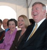 Enjoying the festivities at the groundbreaking for the McGovern Institute for Brain Research are (from left) Professor Phillip A. Sharp, director of the McGovern Institute; Rebecca Vest; Lore Harp McGovern; and Patrick J. McGovern Jr.