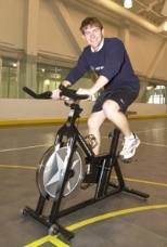 Kyle Rattray trains in the gym for his cross-country bike trek to raise money for cancer research.