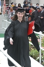 Christine Bataille struts off the platform after collecting her M.B.A.