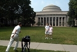 MIT alumnus John Wilkens (Ph.D. 1977) runs to join a self-timer snapshot of himself with his wife, Lucie Wilkens (Ph.D. 1977) and their son, 18-year-old freshman Chris Wilkens.
