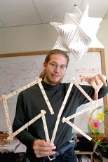 Erik Demaine solved the "carpenter's rule problem."