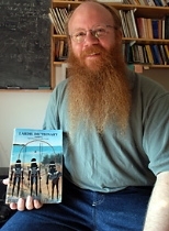 Professor Norvin Richards holds the Lardil dictionary compiled by his late mentor, Professor Kenneth Hale, and others.